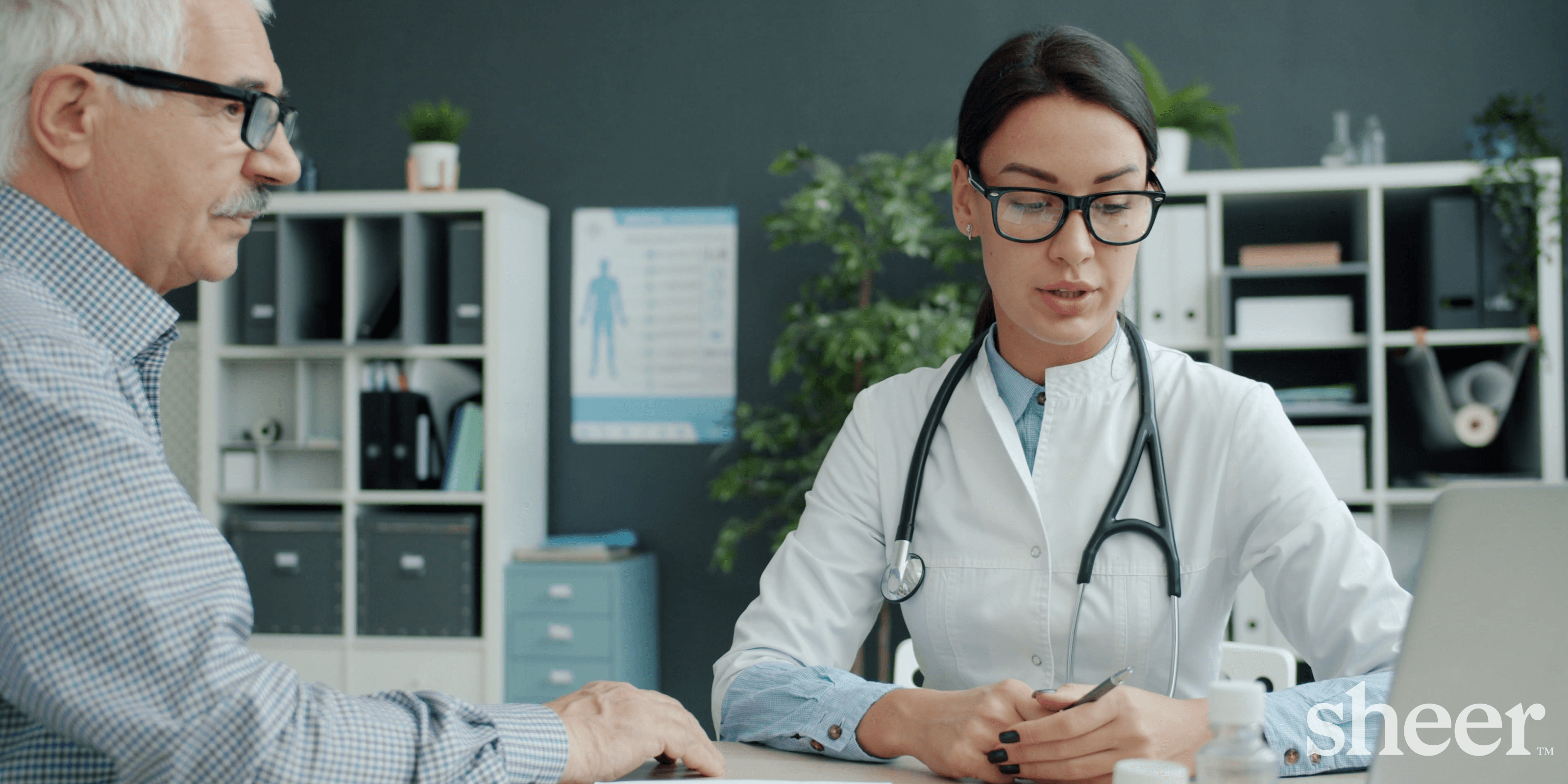 An image of a doctor reviewing paperwork.